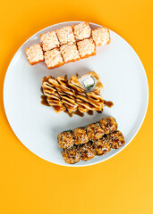 Various rolls on an orange background