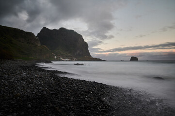 Beach Praia da Maiata on the Atlantic Ocean near village Porto da Cruz, Madeira island, Portugal