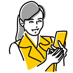 スマホを見て微笑む働く女性