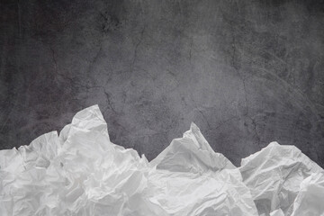 Airy white paper on a black background. Backgrounds and textures