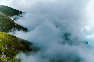 CLOUDS IN THE MOUNTAINS
