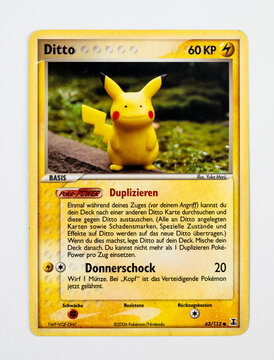 Foto de Hamburg, Germany - 06212021: frontside macro photo of the english  TCG pokemon shining fates card Ditto V (SHF 50) on white background. do  Stock