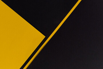 Black and yellow background divided with diagonal line