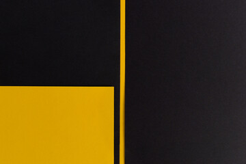 Geometric black and yellow background divided vertically - obrazy, fototapety, plakaty