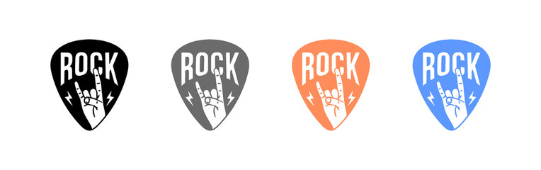 Pick for guitar with the inscription Rock. Play electric, bass guitar music in the style of rock and roll. Music concept. Editorial