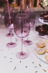 Pink glasses in the style of a bachelorette party. 