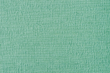The Green Classic Primed Artist's Canvas Fabric Background as Texture Grid Pattern Macro Photography Copy Space Design template for presentation.