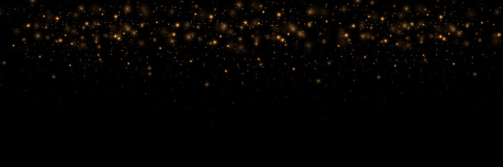 Fototapeta na wymiar Golden effect glow, glare, explosion, glitter, sun glare, sparks and stars on black background