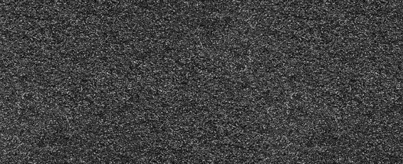 Black crushed shale rock, slate chip stone wide texture. Panoramic dark textured background