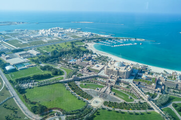 Fototapeta na wymiar Bird's eye and aerial drone view of Abu Dhabi city from observation deck