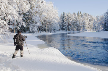 Frosty morning in a wintry river landscape. Farnebofjarden national park in north of Sweden.