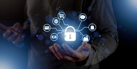 cyber security internet and networking concept. Businessman hand working with VR screen padlock icon on computer background