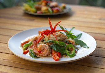 shrimp pad kapao - Thaï food with thaï basilic and vegetables