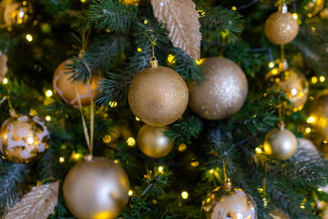 golden balls on the christmas tree for background