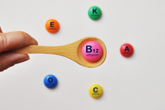 Vitamin B12 on a spoon. Food with a high content of vitamin B