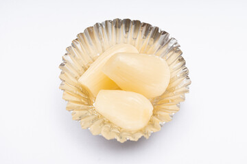 Korean side dishes in a delicious-looking silver foil case