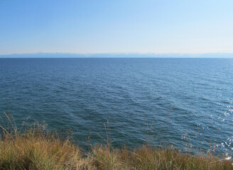 view from the shore to the endless expanse of the cleanest lake on the planet - Baikal