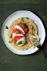 Omelette caprese with mozzarella, tomato and basil