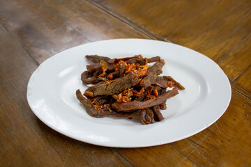 Deep fried sun-dried beef, Thai street food.