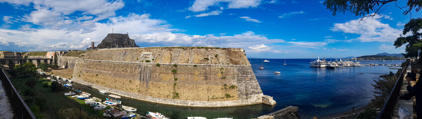 panoramic Corfu Castle old fort Greek island surrounded by blue sea sky  a tourist attraction in Mediterranean Greece.