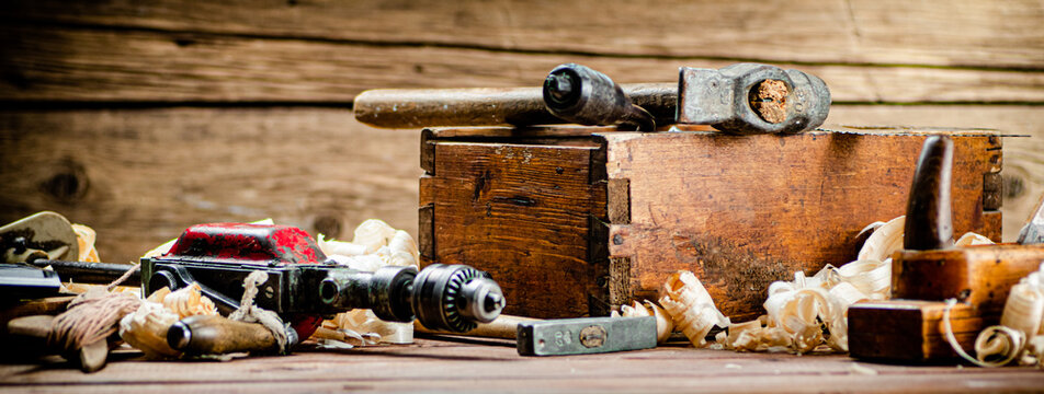 Various working tools on wood on the table. 