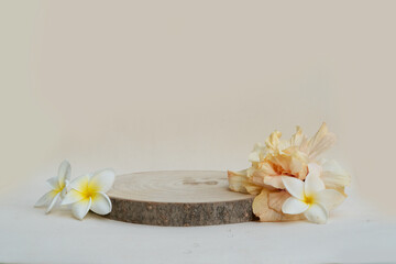 Minimal modern product display podium on neutral background with natural podium, tropical summer flowers