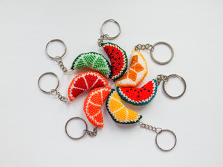 Bead colorful key chains on a white background