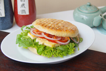 Vegetarian burger made with a mixture of vegetables and products such as tofu or seitan.