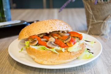 Vegetarian burger made with a mixture of vegetables and products such as tofu or seitan.