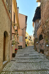 A narrow street in the historic center of Priverno, an old village in Lazio, not far from Rome, Italy.