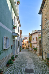 A narrow street in the historic center of Priverno, an old village in Lazio, not far from Rome, Italy.