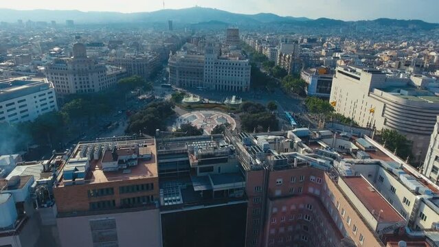 Top down footage of large church and surrounding buildings. Cathedral of Barcelona with gothic tower. Barcelona, Spain