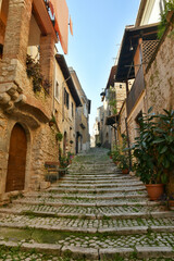 A narrow street in the historic center of Priverno, an old village in Lazio, not far from Rome, Italy.