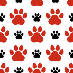 Fototapeta premium Bright seamless pattern with pet footprints. Red and black paw prints. Vector