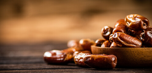 Ripe dates on a plate. 