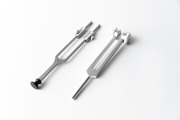 tuning fork C 128 on a white background with gradation