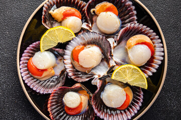 scallops in shell fresh seafood meal food snack on the table copy space food background rustic top view pescatarian diet