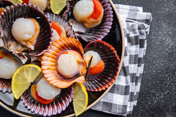 scallops in shell fresh seafood meal food snack on the table copy space food background rustic top view pescatarian diet