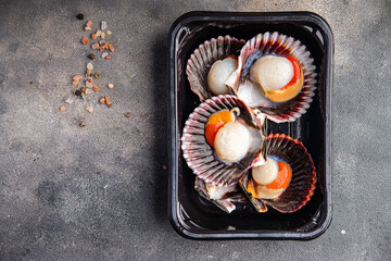 scallops in shell fresh seafood meal food snack on the table copy space food background rustic top view pescatarian diet