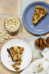 Homemade Russian Honey dates and peanuts cake. Honey cake Medovik 