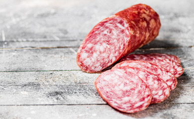 Delicious salami sausage on the table. 