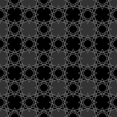 Seamless black and grey vector pattern with decorative tile print on dark background