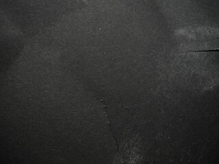 macro photo of dark thick torn dirty paper texture.	