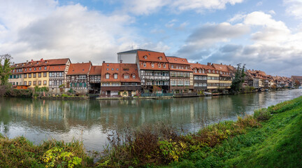Fototapeta na wymiar Panoramic view of Colorful houses at Linker Regnitzarm riverbank - Bamberg, Bavaria, Germany