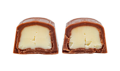 The chocolate bar is broken into pieces. Candy with milk filling