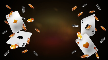 Flying playing cards and poker chips on gold shiny blurred background