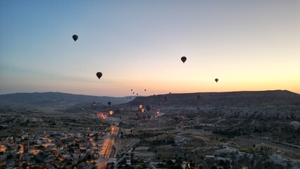 Incredible sunrise and balloons over the hills in Cappadocia. The view from the drone.