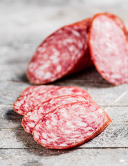Delicious salami sausage on the table. 
