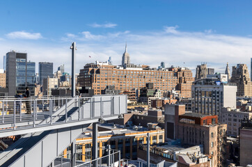 Buildings in lower Manhattan viewed from the High Line, brick, concrete, steel construction, sunny,...