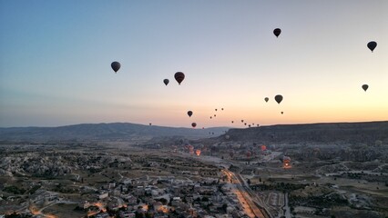 Incredible sunrise and balloons over the hills in Cappadocia. The view from the drone.